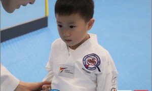 Taekwondo students start their new chapter in the martial arts world 跆拳道学员开启武术世界新篇章