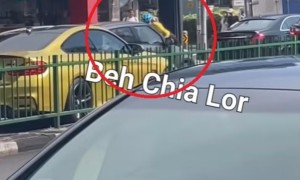 视频|公路争霸！新加坡女骑士冒险跳上轿车引发连环追逐引网友疯传